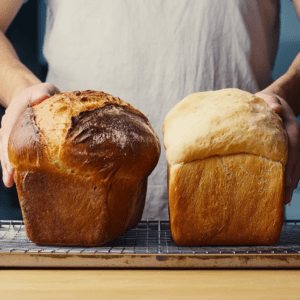 Freshly baked bread loaves on a cooling rack for delicious homemade bread recipes.