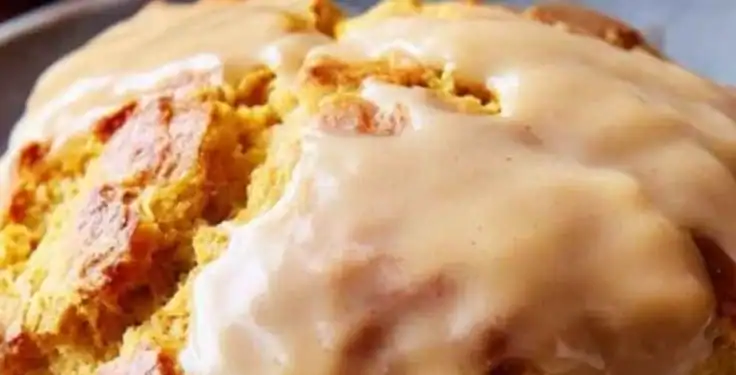 Delicious Pioneer Woman pumpkin scones on a wooden table