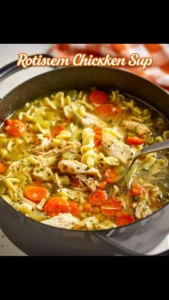 Bowl of homemade Rotisserie Chicken Noodle Soup with fresh vegetables and noodles