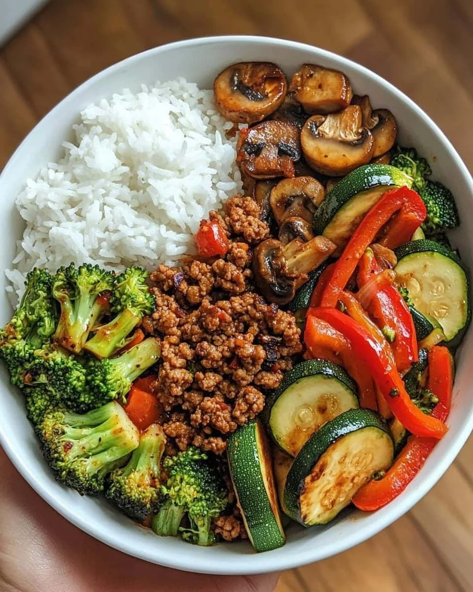 Spicy Ground Beef Stir-Fry Bowl with Garlic Veggies and Steamy Rice